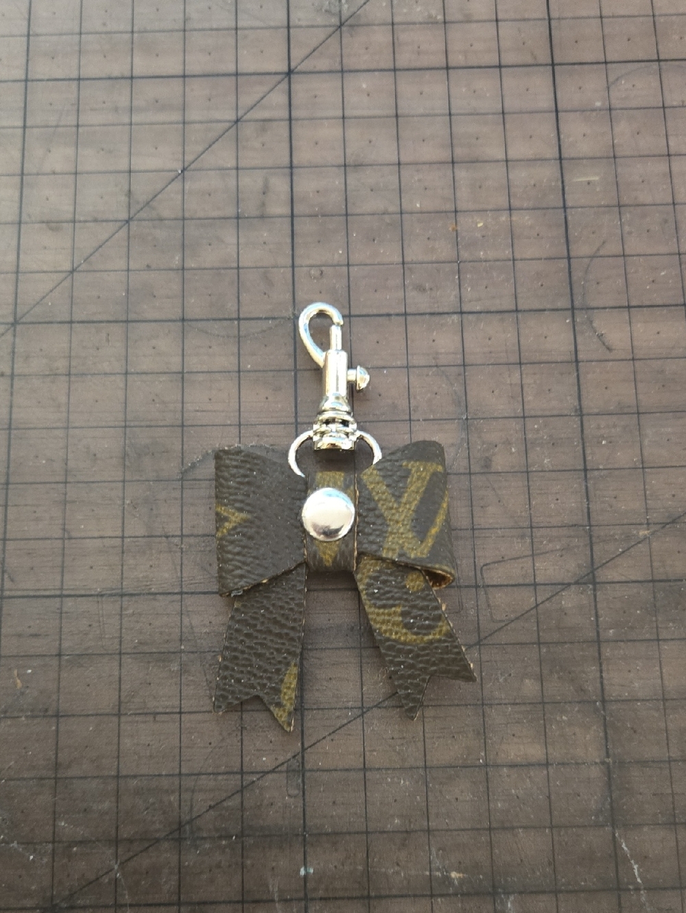 Small Monogram Bow Keychain Charm in Brown and Gold